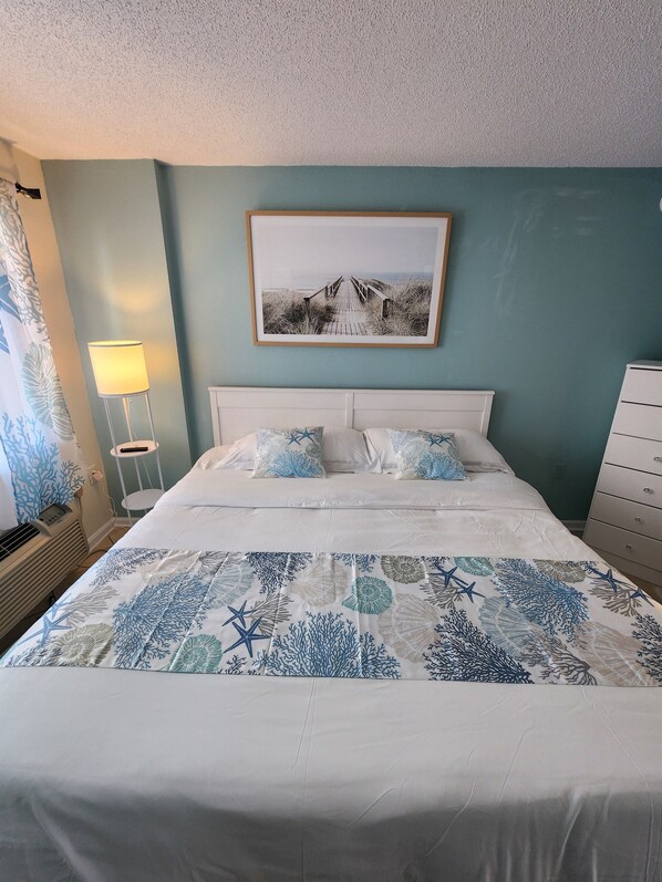 Beautifuly decorated bedroom with King Bed with  new memory foam topper! 
