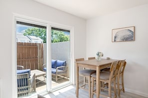 Dining space accommodating up to four people.
