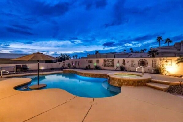Relax by the sparkling pool oasis.