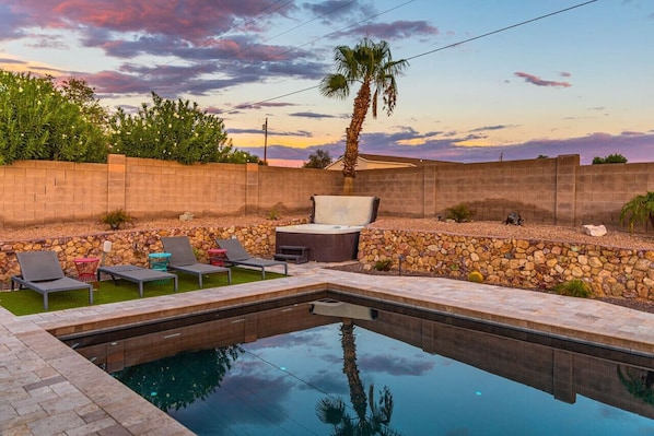 Unwind in the sparkling pool, soak in the hot tub