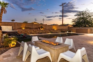 Gather around the fire pit for a cozy evening under the stars.