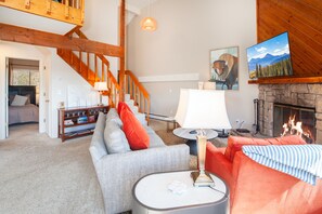 Relax after a ski day and warm up next to a cozy wood burning fireplace