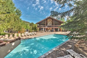 Communal clubhouse with a heated pool, indoor and outdoor hot tubs, and sauna