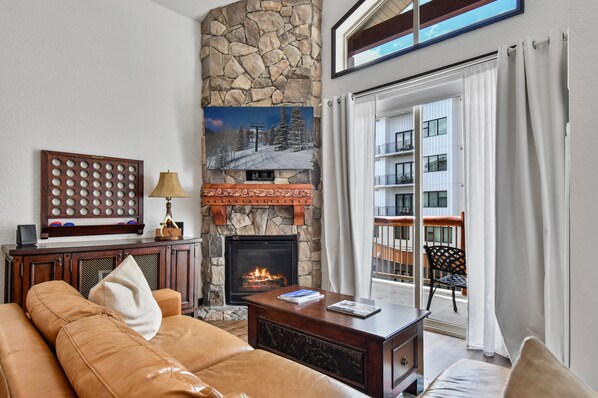 Light-filled living room with sofa sleeper.