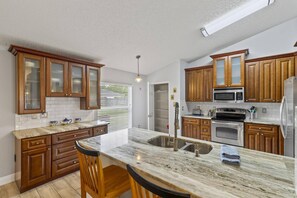 Full Size Kitchen With Stove, Oven, Dishwasher, Island, Refrigerator & Essentials