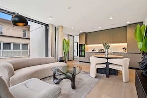 Seamless living: from plush sofa to sleek kitchen, find your flow.