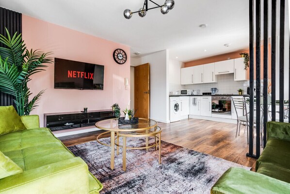 Living room  - 50'  Smart TV loaded with Netflix, ambient lighting,  extra fast Wi-Fi - Complimentary tea & coffee available for your enjoyment