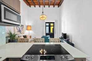 The kitchen is adjacent to the living space, creating an open concept layout.