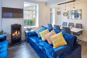 Cosy lounge with gas firelace