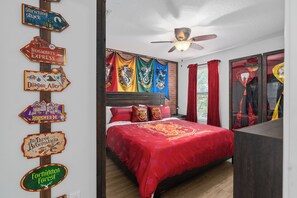 Upstairs Harry Potter themed bedroom with a king bed and 55" TV