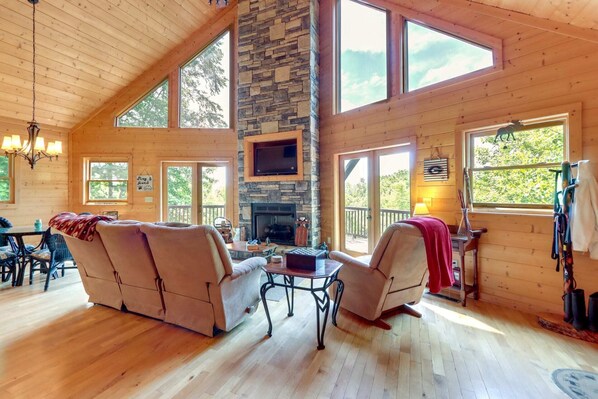 Living Room with Cathedral ceilings. Light is amazing!