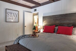 Downstairs is the master bedroom with a king sized bed.