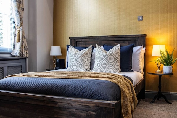 Double bed and Nespresso machine.