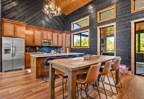 Gather around the table for a family feast or a game night — our spacious kitchen is ready for any plan