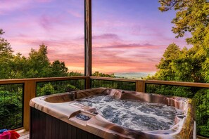 Relax in privacy in the hot tub while enjoying the view.