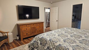 Large Smart TV in Master Bedroom