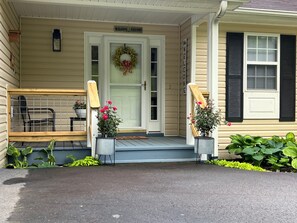 The Front Porch is a Tranquil place for morning coffee and listing to birds sing