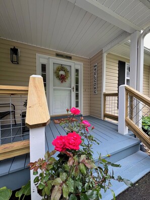 Front Porch Entry has a combination key pad entry lock on post