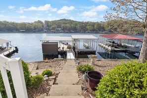 Private dock with easy access to the serene lake—ideal for boating, fishing, and soaking in beautiful waterfront views.