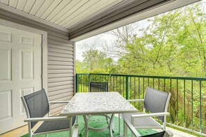 Condo Exterior | Private Balcony w/ Dining Area | Creek Views