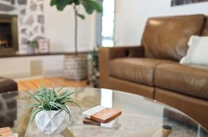 Whether it's curling up with a good book or entertaining friends, this living room setup has everything you need for comfort and style.