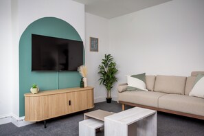 Tune into your favorite shows or indulge in a movie night on the sleek TV, creating moments of shared joy with your loved ones.