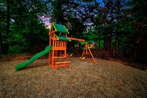 Adventure awaits! Your little ones will love swinging and sliding in nature!