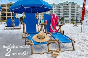 No more lugging chairs and umbrellas- Beach service set up is included with your stay March through October!