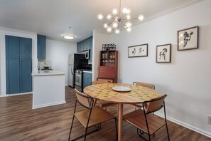 Dining area with view of kitchen