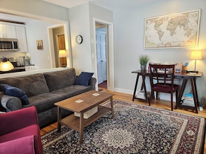 Living room - Includes full-size pullout sofa bed with 6" memory foam mattress.