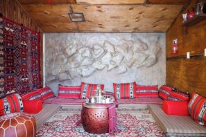 House Bedouins.
 you will set on the floor @ experience the Bedouins lifestyle.