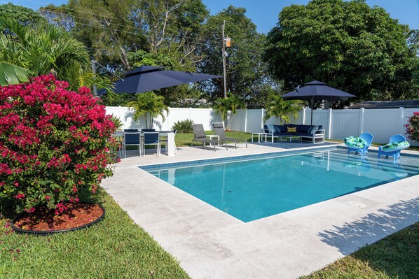 Back yard and pool area with everything you desire.
