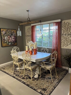 Dining room, table seats 6+.