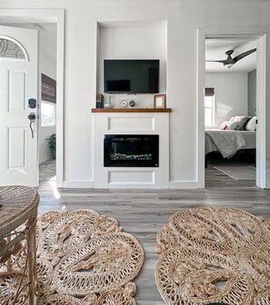 The electric fireplace adds a ton of charm, and the tide clock tells you when to hit the beach!