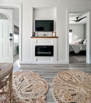 The electric fireplace adds a ton of charm, and the tide clock tells you when to hit the beach!