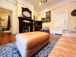 Spacious living room area with separate Aircon for this living area for your comfort.