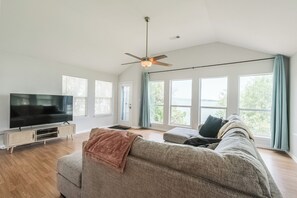 Spacious living room with lake views.