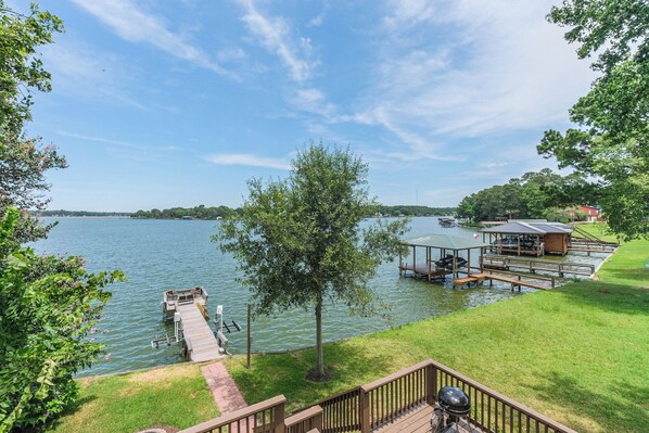 Backyard with private dock. Perfect for swimming, fishing, and relaxing!
