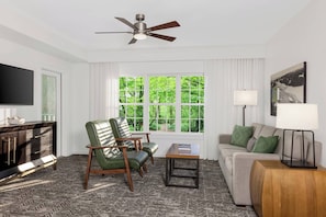 Separate Living Area with a sleeper sofa for two extra guests.