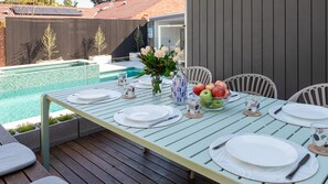 Missy's Escape Outdoor Dining by the Pool 