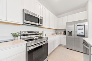 Kitchen#Disney #Parks #kingdom #springs #Vacation #Rental #waterpark #davenport #Kissimmee #Orlando #universal #citywalk #legoland #shortstay #longstay #championsgate #resort #golf #enclave #championsgatevacation