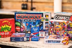 With a collection of classic games like Monopoly and Uno, our game shelf is stocked to keep everyone entertained and laughing for hours.