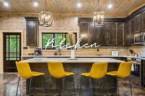 Our kitchen is fully equipped and ready for you to whip up your favorite meals. Bright and welcoming, it's the heart of the home.