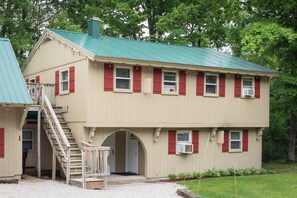Front of main house on right and studio is on the left