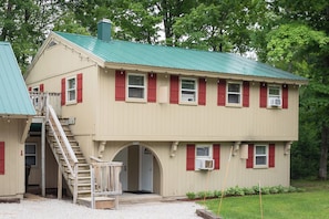 Front of main house on right and studio is on the left