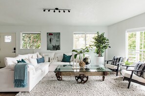 relax in our beautifully decorated living room and down filled sectional couch
