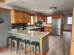 Kitchen has new appliances and large pantry