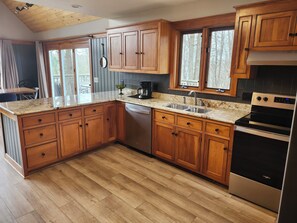 Full stocked and equipped large kitchen