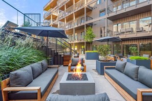 Fireplace and seating by the pool