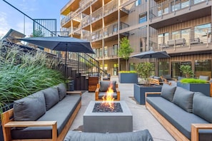 Fireplace and seating by the pool